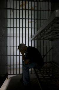 Man in Prison Cell